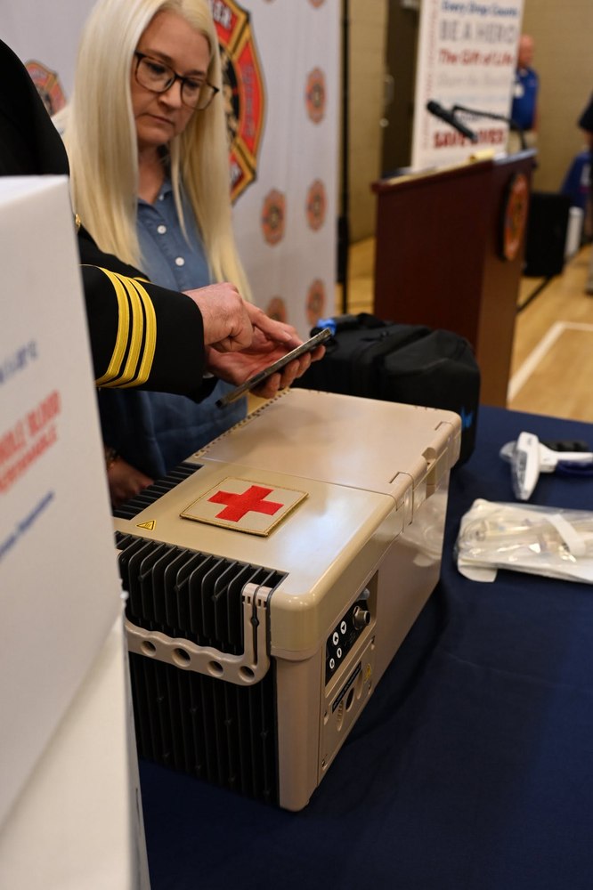 Gilmer County Fire/Rescue chief demonstrating the prehospital blood storage unit