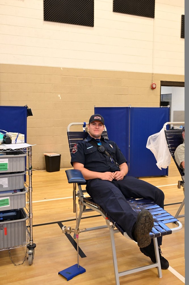 Gilmer County Fire/Rescue firefighter donating blood at a LifeSouth blood drive