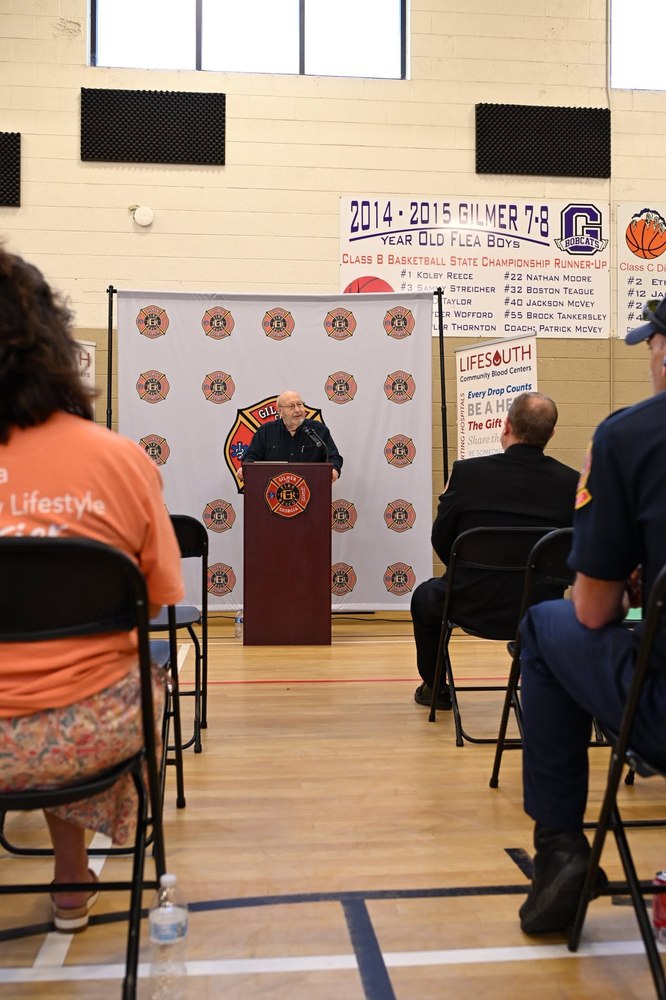 A speaker at the podium during the blood program launch event