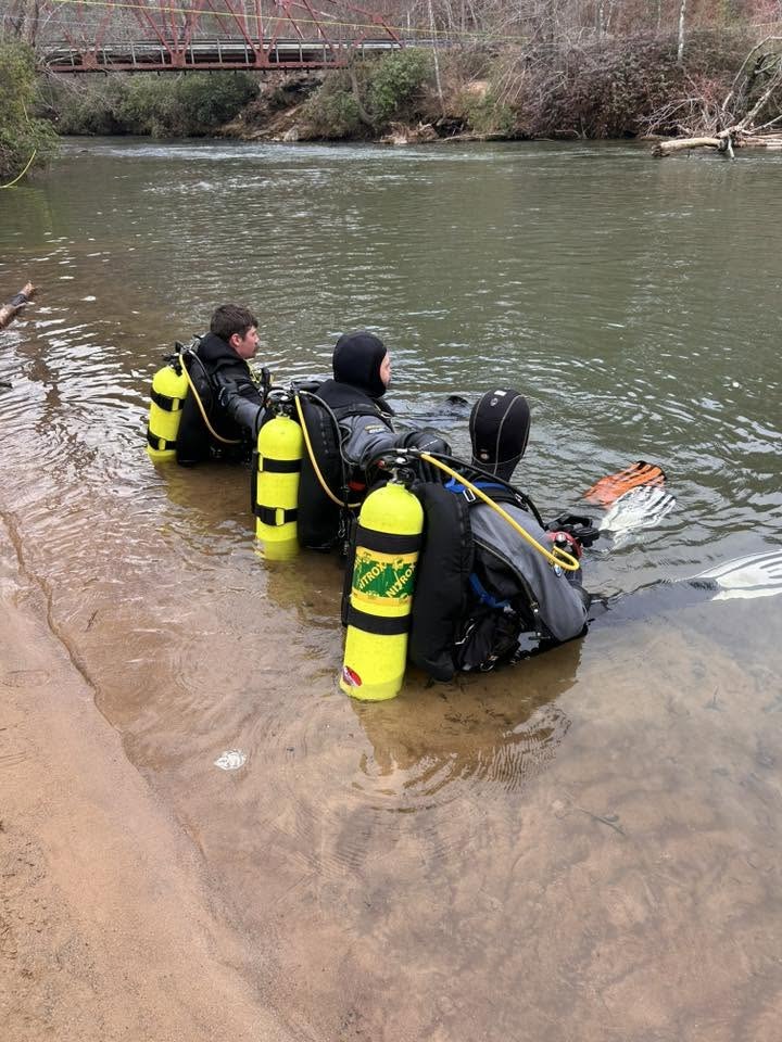 Gilmer County Fire/Rescue dive team wading into the river for training