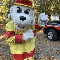 Sparky the Fire Dog mascot at a Gilmer County Fire/Rescue community event