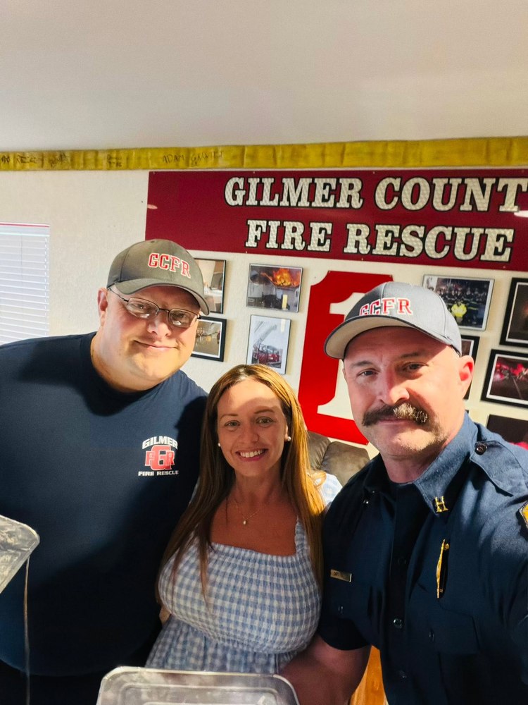 Gilmer County Fire/Rescue members with a visitor at the station