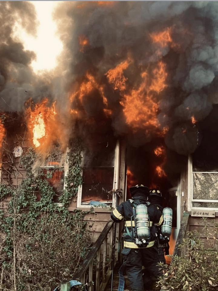 Gilmer County Fire/Rescue firefighters working an active structure fire