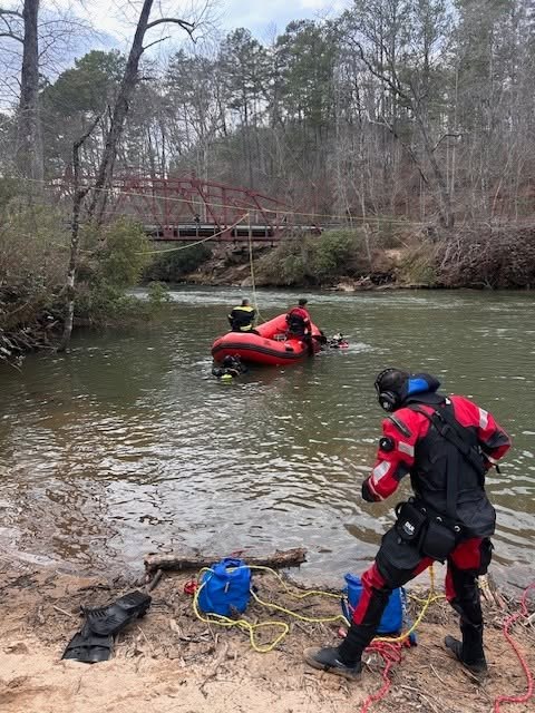 Gilmer County Fire/Rescue dive team and inflatable rescue boat on the river