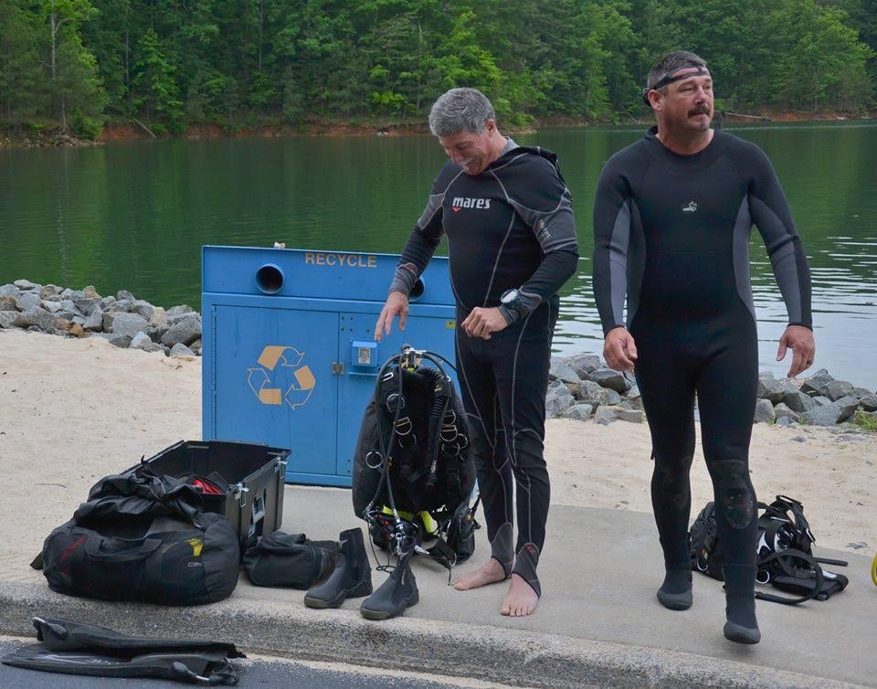 Gilmer County Fire/Rescue dive team members gearing up on the shore
