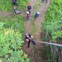 Bird's-eye view of a Gilmer County Fire/Rescue member on a rope during technical rescue training